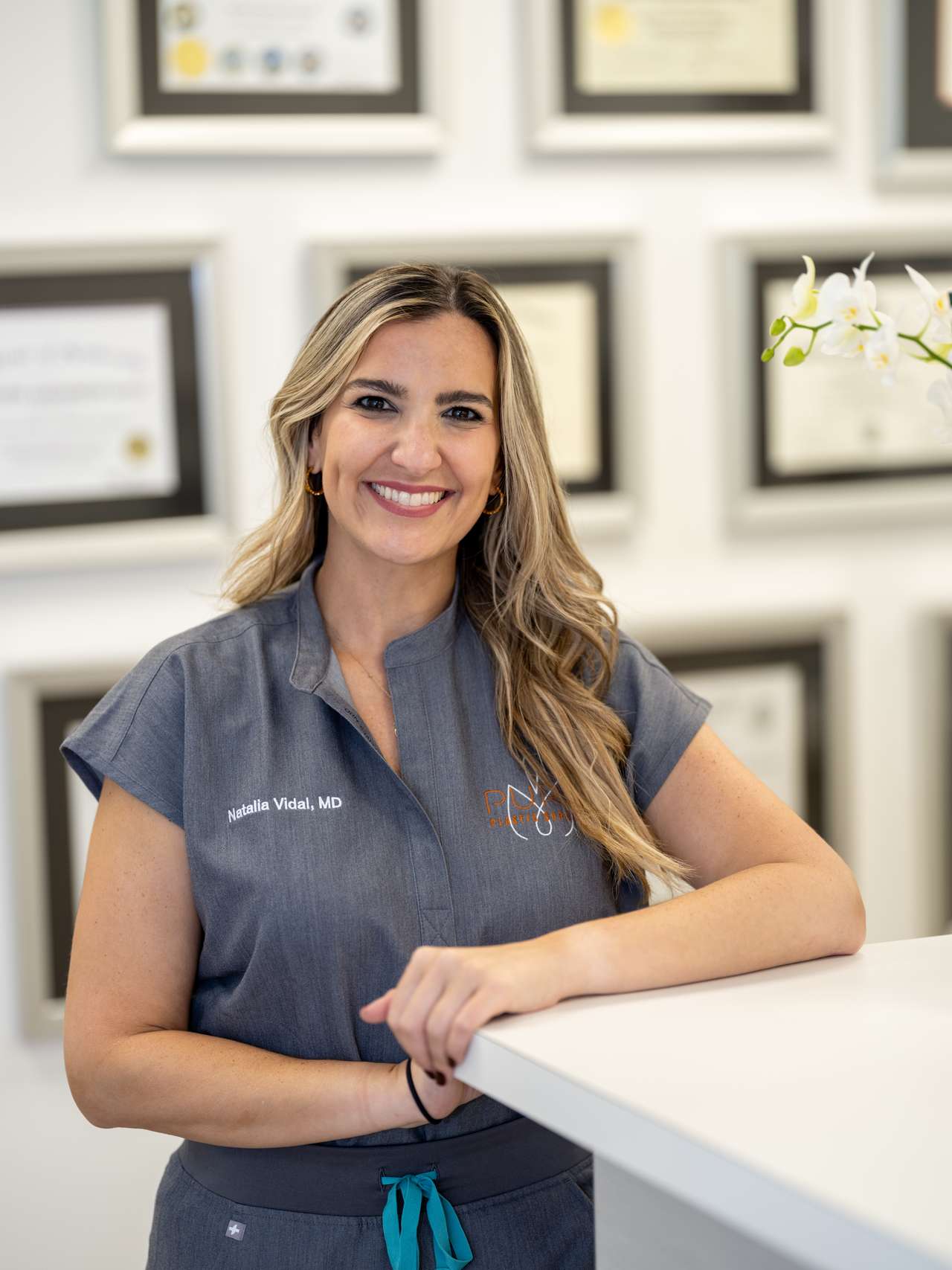 Dr. Natalia Vidal Laureano, MD, FACS, a double board-certified plastic surgeon in Miami offering breast, body, and facial cosmetic surgery with personalized care and a focus on natural results and patient safety.
